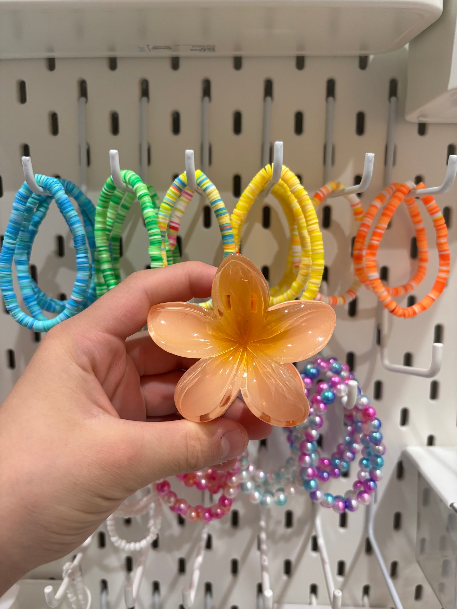 Hibiscus flower hair clip Reece’s coastal bracelets